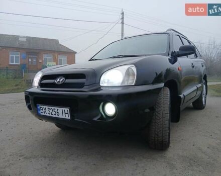 Черный Хендай Санта Фе, объемом двигателя 2.66 л и пробегом 195 тыс. км за 5699 $, фото 2 на Automoto.ua