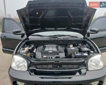 Черный Хендай Санта Фе, объемом двигателя 2.66 л и пробегом 195 тыс. км за 5699 $, фото 57 на Automoto.ua