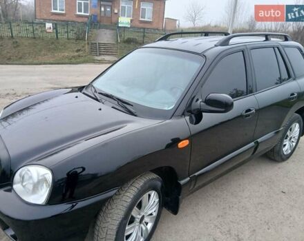 Черный Хендай Санта Фе, объемом двигателя 2.66 л и пробегом 195 тыс. км за 5699 $, фото 5 на Automoto.ua