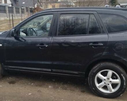 Черный Хендай Санта Фе, объемом двигателя 2.19 л и пробегом 240 тыс. км за 8300 $, фото 5 на Automoto.ua