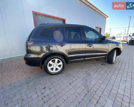 Черный Хендай Санта Фе, объемом двигателя 2.19 л и пробегом 224 тыс. км за 9900 $, фото 1 на Automoto.ua