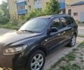 Черный Хендай Санта Фе, объемом двигателя 2.2 л и пробегом 314 тыс. км за 8500 $, фото 1 на Automoto.ua