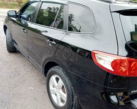 Черный Хендай Санта Фе, объемом двигателя 2.7 л и пробегом 152 тыс. км за 10500 $, фото 1 на Automoto.ua