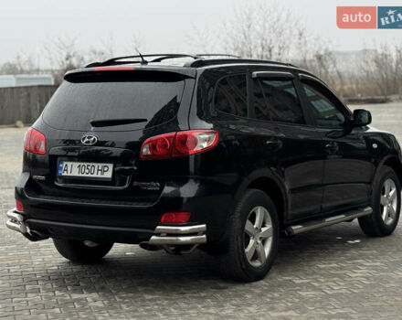 Чорний Хендай Санта Фе, об'ємом двигуна 2.7 л та пробігом 192 тис. км за 9300 $, фото 5 на Automoto.ua