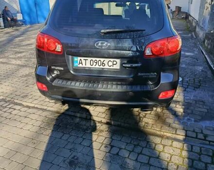 Черный Хендай Санта Фе, объемом двигателя 2.19 л и пробегом 179 тыс. км за 10300 $, фото 7 на Automoto.ua