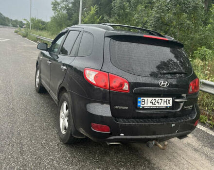Черный Хендай Санта Фе, объемом двигателя 2.2 л и пробегом 260 тыс. км за 10000 $, фото 4 на Automoto.ua