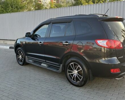 Черный Хендай Санта Фе, объемом двигателя 2.7 л и пробегом 112 тыс. км за 10300 $, фото 1 на Automoto.ua