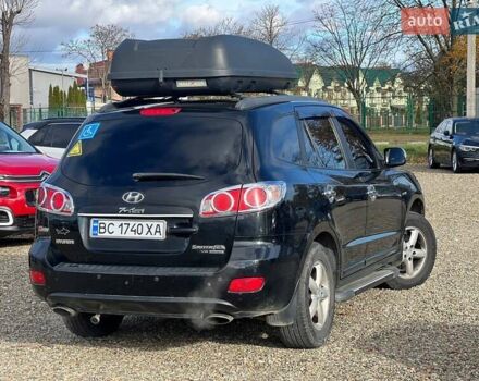 Черный Хендай Санта Фе, объемом двигателя 2.7 л и пробегом 208 тыс. км за 8700 $, фото 5 на Automoto.ua