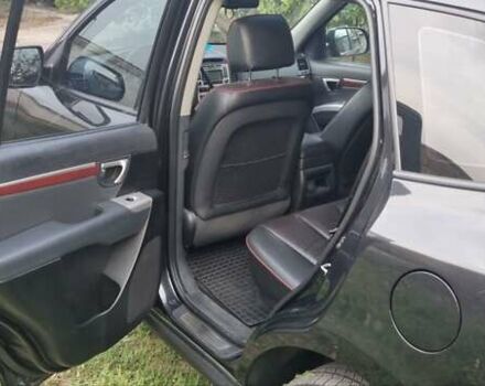 Черный Хендай Санта Фе, объемом двигателя 2.66 л и пробегом 141 тыс. км за 10600 $, фото 10 на Automoto.ua