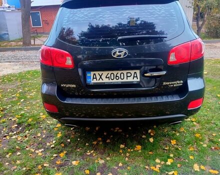 Черный Хендай Санта Фе, объемом двигателя 2.7 л и пробегом 302 тыс. км за 9100 $, фото 3 на Automoto.ua
