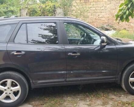 Черный Хендай Санта Фе, объемом двигателя 2.66 л и пробегом 141 тыс. км за 10600 $, фото 1 на Automoto.ua