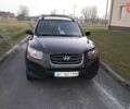 Черный Хендай Санта Фе, объемом двигателя 2.36 л и пробегом 300 тыс. км за 9400 $, фото 1 на Automoto.ua