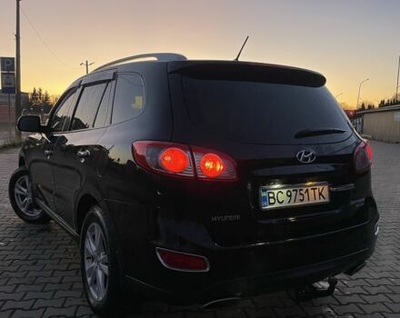 Чорний Хендай Санта Фе, об'ємом двигуна 2.4 л та пробігом 255 тис. км за 9600 $, фото 4 на Automoto.ua