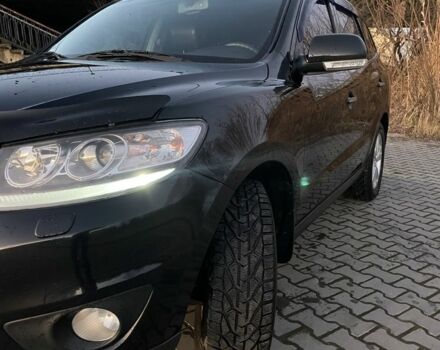 Чорний Хендай Санта Фе, об'ємом двигуна 2.4 л та пробігом 255 тис. км за 9600 $, фото 2 на Automoto.ua
