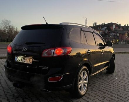 Чорний Хендай Санта Фе, об'ємом двигуна 2.4 л та пробігом 255 тис. км за 9600 $, фото 3 на Automoto.ua