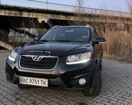 Чорний Хендай Санта Фе, об'ємом двигуна 2.4 л та пробігом 255 тис. км за 9600 $, фото 1 на Automoto.ua