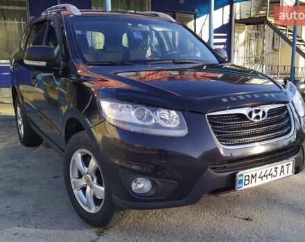 Черный Хендай Санта Фе, объемом двигателя 2.4 л и пробегом 195 тыс. км за 11250 $, фото 2 на Automoto.ua