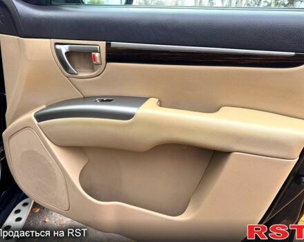 Чорний Хендай Санта Фе, об'ємом двигуна 2.4 л та пробігом 158 тис. км за 12450 $, фото 7 на Automoto.ua