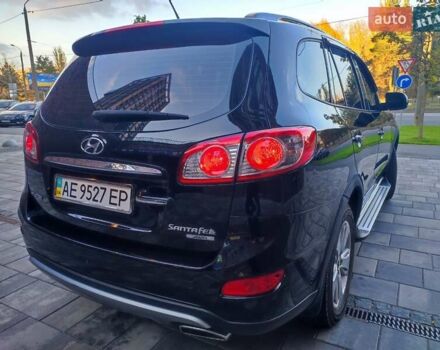 Чорний Хендай Санта Фе, об'ємом двигуна 2.36 л та пробігом 131 тис. км за 12600 $, фото 1 на Automoto.ua