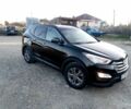 Черный Хендай Санта Фе, объемом двигателя 2.4 л и пробегом 136 тыс. км за 13669 $, фото 1 на Automoto.ua