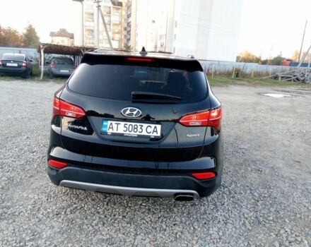 Черный Хендай Санта Фе, объемом двигателя 2.4 л и пробегом 136 тыс. км за 13669 $, фото 4 на Automoto.ua