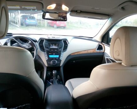 Черный Хендай Санта Фе, объемом двигателя 2.4 л и пробегом 136 тыс. км за 13669 $, фото 2 на Automoto.ua