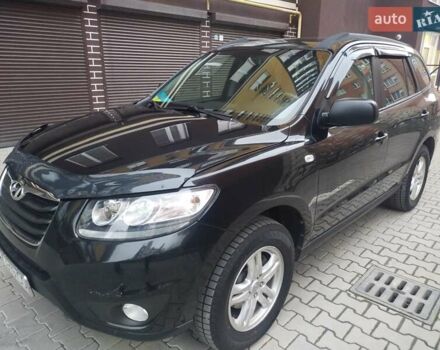Черный Хендай Санта Фе, объемом двигателя 2.36 л и пробегом 264 тыс. км за 10200 $, фото 15 на Automoto.ua