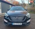 Черный Хендай Санта Фе, объемом двигателя 2.36 л и пробегом 223 тыс. км за 14800 $, фото 1 на Automoto.ua