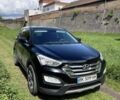 Черный Хендай Санта Фе, объемом двигателя 2.4 л и пробегом 164 тыс. км за 13500 $, фото 1 на Automoto.ua