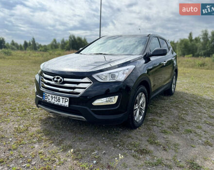 Чорний Хендай Санта Фе, об'ємом двигуна 2.36 л та пробігом 134 тис. км за 13599 $, фото 1 на Automoto.ua