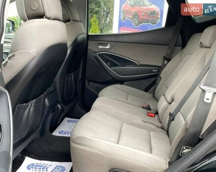 Черный Хендай Санта Фе, объемом двигателя 2.36 л и пробегом 150 тыс. км за 12700 $, фото 14 на Automoto.ua