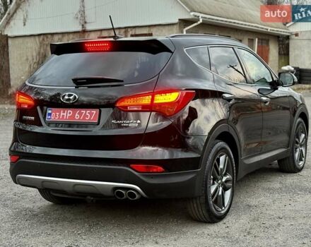 Черный Хендай Санта Фе, объемом двигателя 2.2 л и пробегом 129 тыс. км за 21877 $, фото 3 на Automoto.ua