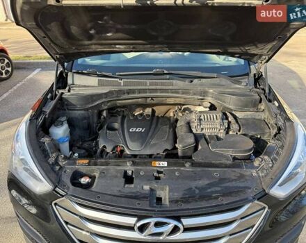 Чорний Хендай Санта Фе, об'ємом двигуна 2.4 л та пробігом 131 тис. км за 15500 $, фото 13 на Automoto.ua