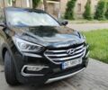 Черный Хендай Санта Фе, объемом двигателя 2.4 л и пробегом 290 тыс. км за 14800 $, фото 1 на Automoto.ua