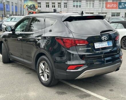 Черный Хендай Санта Фе, объемом двигателя 2.36 л и пробегом 130 тыс. км за 14690 $, фото 6 на Automoto.ua