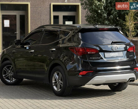 Чорний Хендай Санта Фе, об'ємом двигуна 2.4 л та пробігом 150 тис. км за 14500 $, фото 12 на Automoto.ua