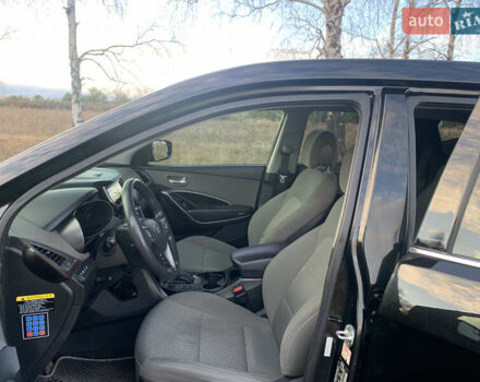 Черный Хендай Санта Фе, объемом двигателя 2.4 л и пробегом 296 тыс. км за 14750 $, фото 6 на Automoto.ua