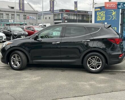 Черный Хендай Санта Фе, объемом двигателя 2.36 л и пробегом 130 тыс. км за 14690 $, фото 7 на Automoto.ua