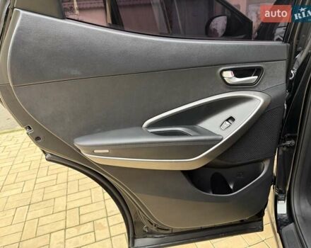 Черный Хендай Санта Фе, объемом двигателя 2.36 л и пробегом 141 тыс. км за 13699 $, фото 18 на Automoto.ua