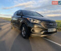 Черный Хендай Санта Фе, объемом двигателя 2.4 л и пробегом 296 тыс. км за 14750 $, фото 1 на Automoto.ua