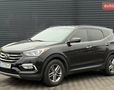 Черный Хендай Санта Фе, объемом двигателя 2.36 л и пробегом 128 тыс. км за 15700 $, фото 1 на Automoto.ua