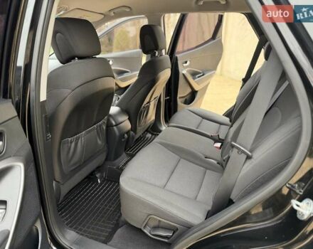 Черный Хендай Санта Фе, объемом двигателя 2.36 л и пробегом 141 тыс. км за 13699 $, фото 16 на Automoto.ua