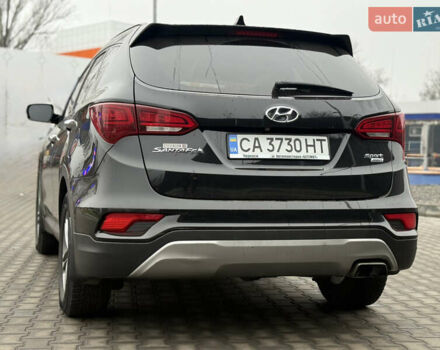 Черный Хендай Санта Фе, объемом двигателя 2.36 л и пробегом 128 тыс. км за 15700 $, фото 13 на Automoto.ua