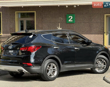 Чорний Хендай Санта Фе, об'ємом двигуна 2.4 л та пробігом 150 тис. км за 14500 $, фото 10 на Automoto.ua