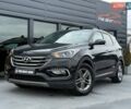 Черный Хендай Санта Фе, объемом двигателя 2.4 л и пробегом 115 тыс. км за 17400 $, фото 1 на Automoto.ua