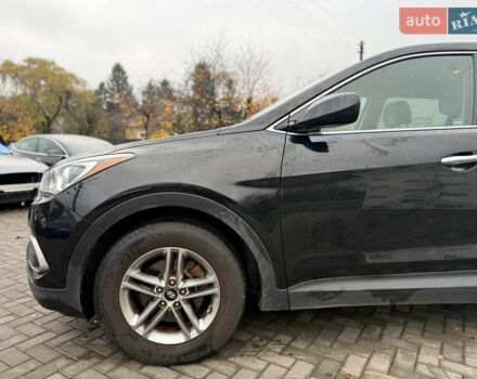 Черный Хендай Санта Фе, объемом двигателя 2.4 л и пробегом 245 тыс. км за 11200 $, фото 2 на Automoto.ua