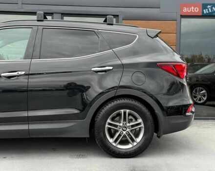 Черный Хендай Санта Фе, объемом двигателя 2.4 л и пробегом 115 тыс. км за 17400 $, фото 6 на Automoto.ua