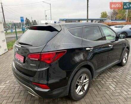 Черный Хендай Санта Фе, объемом двигателя 2.4 л и пробегом 245 тыс. км за 11200 $, фото 4 на Automoto.ua