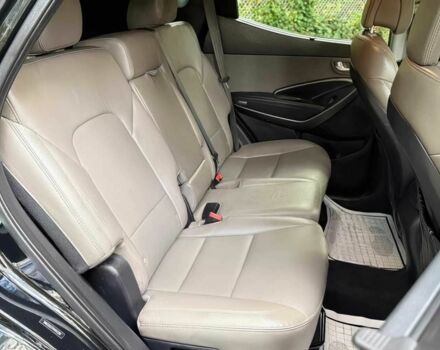 Чорний Хендай Санта Фе, об'ємом двигуна 2.4 л та пробігом 52 тис. км за 14100 $, фото 10 на Automoto.ua