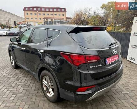 Черный Хендай Санта Фе, объемом двигателя 2.4 л и пробегом 245 тыс. км за 11200 $, фото 3 на Automoto.ua